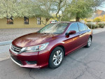 2013 Honda Accord LX Sedan in burgundy color parked on street, showcasing clean exterior with tinted windows.