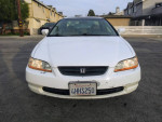 Front view of a 2000 Honda Accord EX-L in pearl white with cream leather interior, parked in California.
