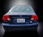 2005 Honda Civic GX rear view showcasing clean body and CNG sticker, ideal for eco-friendly transportation.